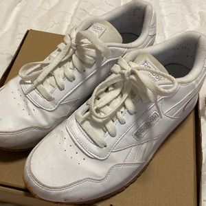 Used white Reebok sneakers